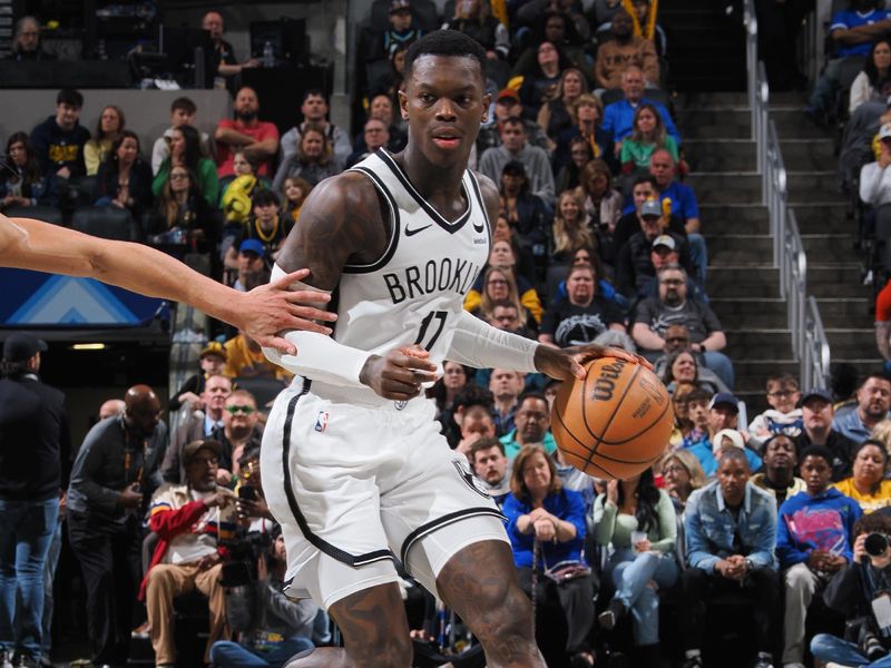 INDIANAPOLIS, IN - MARCH 16: Dennis Schroder #17 of the Brooklyn Nets handles the ball during the game against the Indiana Pacers on March 16, 2024 at Gainbridge Fieldhouse in Indianapolis, Indiana. NOTE TO USER: User expressly acknowledges and agrees that, by downloading and or using this Photograph, user is consenting to the terms and conditions of the Getty Images License Agreement. Mandatory Copyright Notice: Copyright 2024 NBAE (Photo by Ron Hoskins/NBAE via Getty Images)