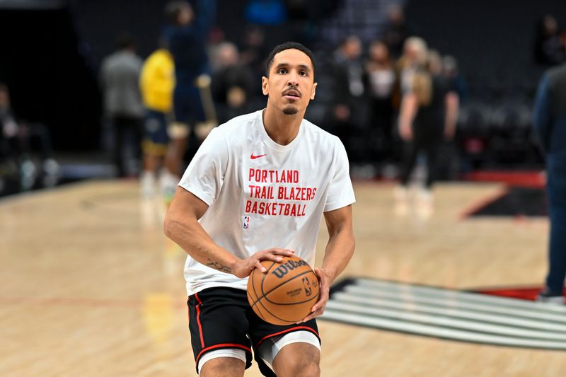 PORTLAND, OREGON - JANUARY 19: Malcolm Brogdon #11 of the Portland Trail Blazers warms up before the game against the Indiana Pacers at Moda Center on January 19, 2024 in Portland, Oregon. NOTE TO USER: User expressly acknowledges and agrees that, by downloading and or using this photograph, User is consenting to the terms and conditions of the Getty Images License Agreement. (Photo by Alika Jenner/Getty Images)