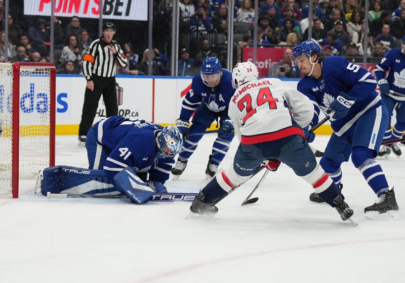 Dec 6, 2024; Toronto, Ontario, CAN; Toronto Maple Leafs goaltender Anthony Stolarz (41) covers up the puck against the Washington Capitals during the second period at Scotiabank Arena. Mandatory Credit: Nick Turchiaro-Imagn Images