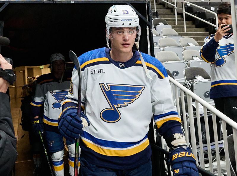 Apr 6, 2024; San Jose, California, USA; St. Louis Blues right wing Alexey Toropchenko (13) walks to the ice for warmups before the game between the San Jose Sharks and the St. Louis Blues at SAP Center at San Jose. Mandatory Credit: Robert Edwards-USA TODAY Sports