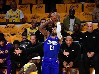 LOS ANGELES, CA - OCTOBER 20: Paul George #13 of the LA Clippers shoots the ball during the game against the Los Angeles Lakers on October 20, 2022 at Crypto.Com Arena in Los Angeles, California. NOTE TO USER: User expressly acknowledges and agrees that, by downloading and/or using this Photograph, user is consenting to the terms and conditions of the Getty Images License Agreement. Mandatory Copyright Notice: Copyright 2022 NBAE (Photo by Adam Pantozzi/NBAE via Getty Images)