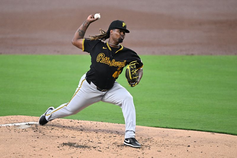 Aug 13, 2024; San Diego, California, USA; Pittsburgh Pirates starting pitcher Luis Ortiz (48) pitches against the San Diego Padres during the second inning at Petco Park. Mandatory Credit: Orlando Ramirez-USA TODAY Sports
