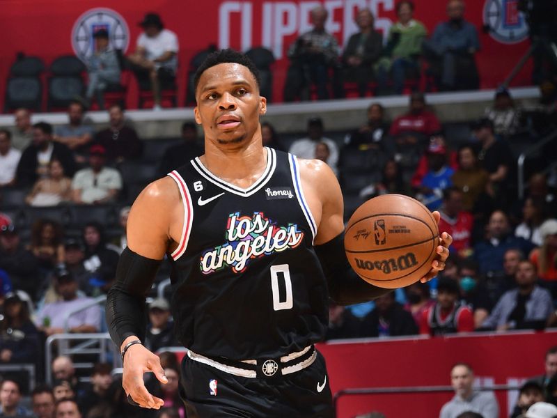 LOS ANGELES, CA - MARCH 18: Russell Westbrook  #0 of the LA Clippers moves the ball during the game against the Orlando Magic on March 18, 2023 at Crypto.Com Arena in Los Angeles, California. NOTE TO USER: User expressly acknowledges and agrees that, by downloading and/or using this Photograph, user is consenting to the terms and conditions of the Getty Images License Agreement. Mandatory Copyright Notice: Copyright 2023 NBAE (Photo by Adam Pantozzi/NBAE via Getty Images)