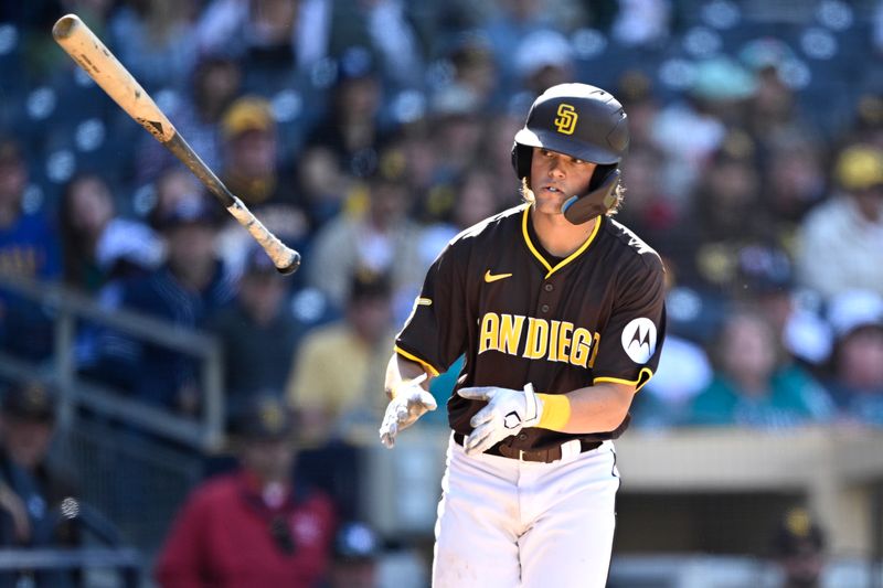 Mar 26, 2024; San Diego, California, USA; San Diego Padres second baseman Nik McClaughry (84) tosses his bat after a walk during the ninth inning against the Seattle Mariners at Petco Park. Mandatory Credit: Orlando Ramirez-USA TODAY Sports