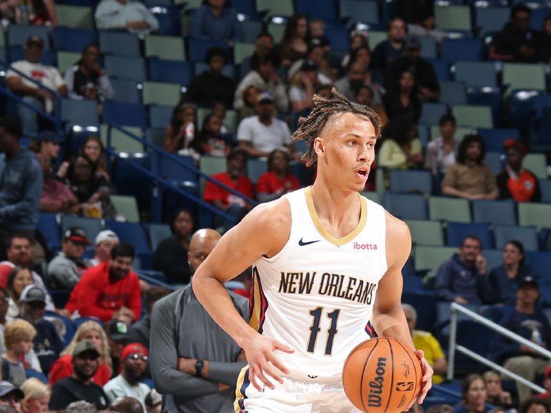 NEW ORLEANS, LA - OCTOBER 10: Dyson Daniels #11 of the New Orleans Pelicans dribbles the ball during the game against the Orlando Magic on October 10, 2023 at the Smoothie King Center in New Orleans, Louisiana. NOTE TO USER: User expressly acknowledges and agrees that, by downloading and or using this Photograph, user is consenting to the terms and conditions of the Getty Images License Agreement. Mandatory Copyright Notice: Copyright 2023 NBAE (Photo by Layne Murdoch Jr./NBAE via Getty Images)