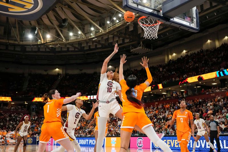 Mar 9, 2024; Greensville, SC, USA; South Carolina Gamecocks center Kamilla Cardoso (10) shoots over Tennessee Lady Vols center Tamari Key (20) during the second half at Bon Secours Wellness Arena. Mandatory Credit: Jim Dedmon-USA TODAY Sports