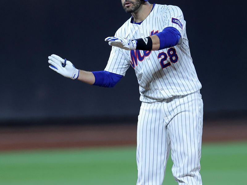Jun 25, 2024; New York City, New York, USA; New York Mets designated hitter J.D. Martinez (28) celebrates his RBI double against the New York Yankees during the sixth inning at Citi Field. Mandatory Credit: Brad Penner-USA TODAY Sports