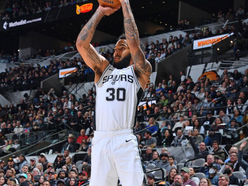 SAN ANTONIO, TX - FEBRUARY 29: Julian Champagnie #30 of the San Antonio Spurs shoots a three point basket during the game against the Oklahoma City Thunder on February 29, 2024 at the Frost Bank Center in San Antonio, Texas. NOTE TO USER: User expressly acknowledges and agrees that, by downloading and or using this photograph, user is consenting to the terms and conditions of the Getty Images License Agreement. Mandatory Copyright Notice: Copyright 2024 NBAE (Photos by Michael Gonzales/NBAE via Getty Images)