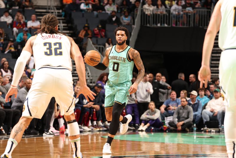 CHARLOTTE, NC - FEBRUARY 1: Miles Bridges #0 of the Charlotte Hornets dribbles the ball during the game against the Denver Nuggets on February 1, 2025 at Spectrum Center in Charlotte, North Carolina. NOTE TO USER: User expressly acknowledges and agrees that, by downloading and or using this photograph, User is consenting to the terms and conditions of the Getty Images License Agreement. Mandatory Copyright Notice: Copyright 2025 NBAE (Photo by Kent Smith/NBAE via Getty Images)