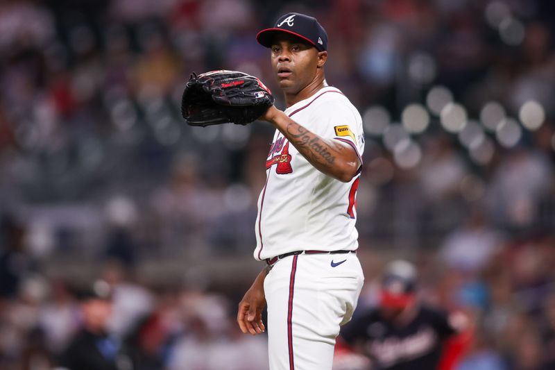 May 12, 2025; Atlanta, Georgia, USA; Atlanta Braves relief pitcher Raisel Iglesias (26) in action against the Washington Nationals in the ninth inning at Truist Park. Mandatory Credit: Brett Davis-Imagn Images
