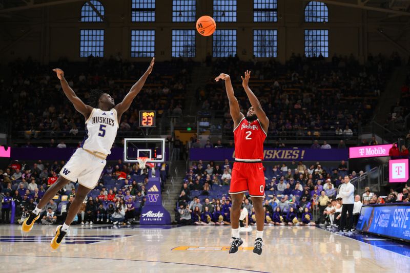 Jan 11, 2026; Seattle, Washington, USA; Ohio State Buckeyes guard Bruce Thornton (2) shoots a three point shot over Washington Huskies guard Zoom Diallo (5) during the second half at Alaska Airlines Arena at Hec Edmundson Pavilion. Mandatory Credit: Steven Bisig-Imagn Images