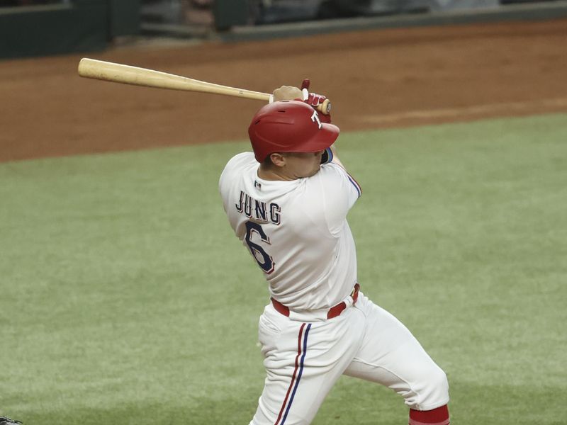 Jun 28, 2023; Arlington, Texas, USA;  Texas Rangers third baseman Josh Jung (6) hits an rbi single during the first inning against the Detroit Tigers at Globe Life Field. Mandatory Credit: Kevin Jairaj-USA TODAY Sports