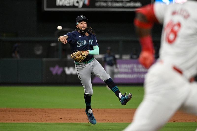 Sep 6, 2024; St. Louis, Missouri, USA; Seattle Mariners shortstop J.P. Crawford (3) throws to first for an out against the St. Louis Cardinals in the fifth inning at Busch Stadium. Mandatory Credit: Joe Puetz-Imagn Images