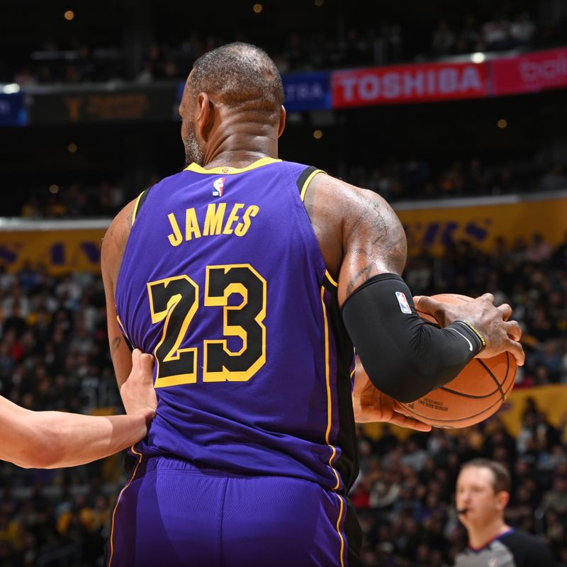 LOS ANGELES, CA - FEBRUARY 9: LeBron James #23 of the Los Angeles Lakers looks to pass the ball during the game against the New Orleans Pelicans on February 9, 2024 at Crypto.Com Arena in Los Angeles, California. NOTE TO USER: User expressly acknowledges and agrees that, by downloading and/or using this Photograph, user is consenting to the terms and conditions of the Getty Images License Agreement. Mandatory Copyright Notice: Copyright 2024 NBAE (Photo by Andrew D. Bernstein/NBAE via Getty Images)