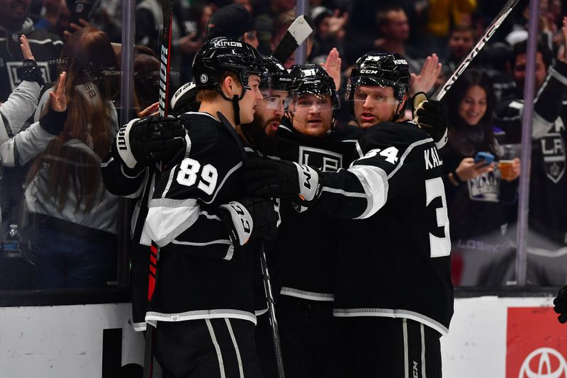 Mar 16, 2023; Los Angeles, California, USA; Los Angeles Kings defenseman Drew Doughty (8) celebrates his goal scored against the Columbus Blue Jackets during the second period at Crypto.com Arena. Mandatory Credit: Gary A. Vasquez-USA TODAY Sports