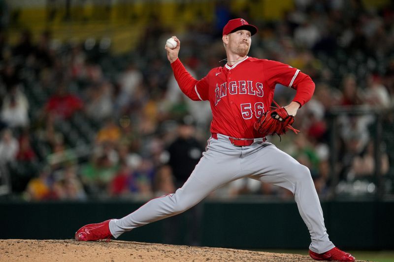 May 21, 2025; West Sacramento, California, USA; Los Angeles Angels pitcher Ryan Zeferjahn (56) delivers a pitch against the Athletics in the eighth inning at Sutter Health Park. Mandatory Credit: Cary Edmondson-Imagn Images