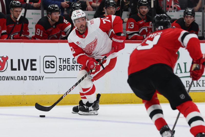 Mar 8, 2026; Newark, New Jersey, USA;  Detroit Red Wings defenseman Justin Faulk (72) skates with the puck against the New Jersey Devils during the first period at Prudential Center. Mandatory Credit: Thomas Salus-Imagn Images