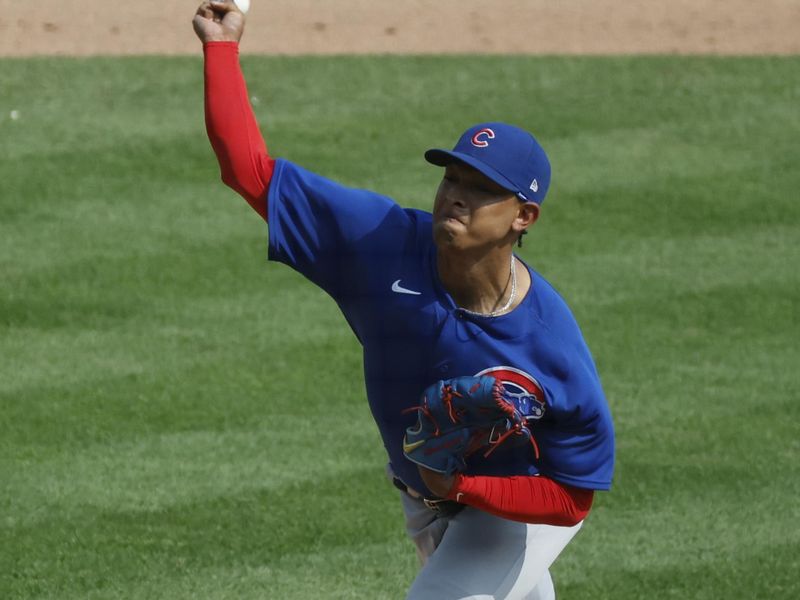 Aug 23, 2023; Detroit, Michigan, USA;  Chicago Cubs relief pitcher Adbert Alzolay (73) pitches in the ninth inning against the Detroit Tigers at Comerica Park. Mandatory Credit: Rick Osentoski-USA TODAY Sports