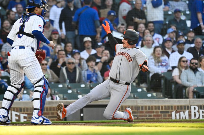 May 6, 2025; Chicago, Illinois, USA;  San Francisco Giants third baseman Matt Chapman (26) scores past Chicago Cubs catcher Miguel Amaya (9) during the second inning at Wrigley Field. Mandatory Credit: Matt Marton-Imagn Images