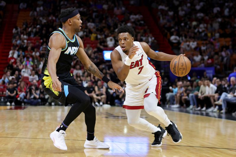 MIAMI, FLORIDA - DECEMBER 02: Kyle Lowry #7 of the Miami Heat drives against Bruce Brown #11 of the Indiana Pacers during the first quarter of the game at Kaseya Center on December 02, 2023 in Miami, Florida. NOTE TO USER: User expressly acknowledges and agrees that, by downloading and or using this photograph, User is consenting to the terms and conditions of the Getty Images License Agreement. (Photo by Megan Briggs/Getty Images)