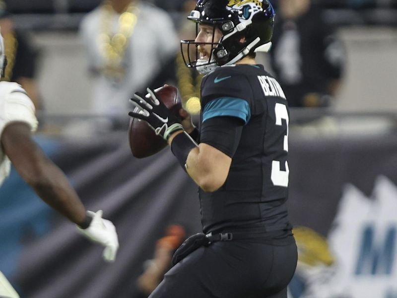 Jacksonville Jaguars quarterback C.J. Beathard (3) looks for a receiver during an NFL football game against the Cincinnati Bengals, Monday, Dec. 4, 2023, in Jacksonville, Fla. (AP Photo/Gary McCullough)