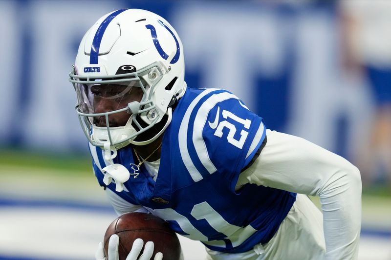 Indianapolis Colts cornerback Dallis Flowers (21) warms up before playing against the Denver Broncos in a preseason NFL football game, Sunday, Aug. 11, 2024, in Westfield, Ind. (AP Photo/Darron Cummings)