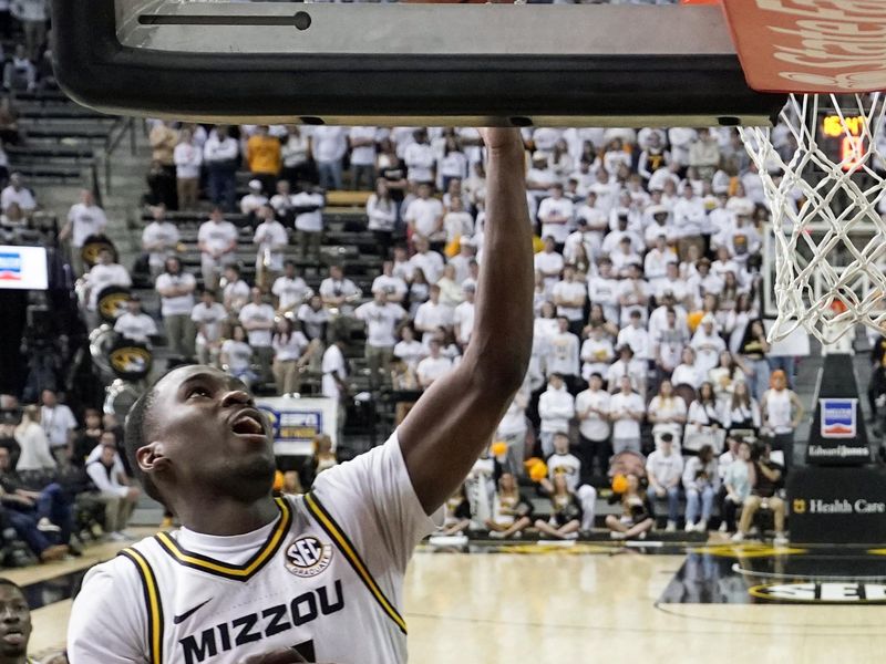 Mar 4, 2023; Columbia, Missouri, USA; Missouri Tigers guard D'Moi Hodge (5) shoots against the Mississippi Rebels during the second half at Mizzou Arena. Mandatory Credit: Denny Medley-USA TODAY Sports