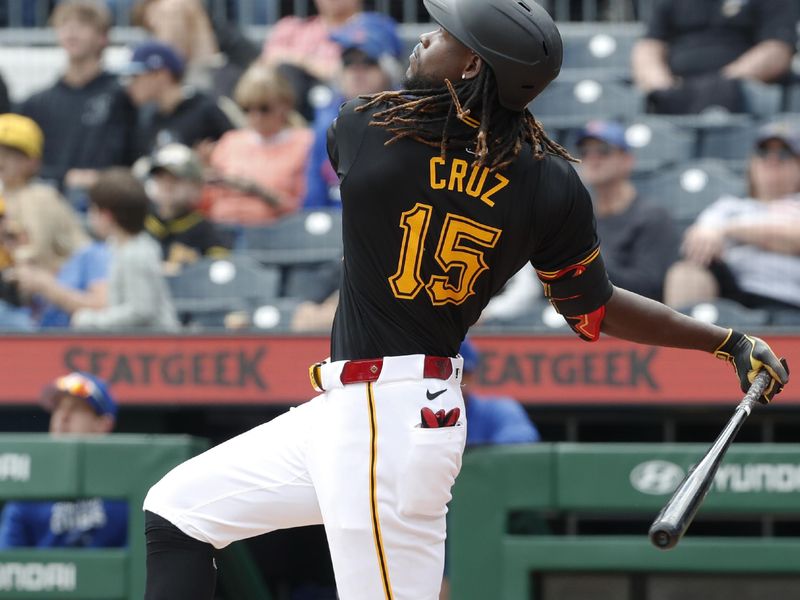 May 12, 2024; Pittsburgh, Pennsylvania, USA;  Pittsburgh Pirates shortstop Oneil Cruz (15) hits a solo home run against the Chicago Cubs during the fourth inning at PNC Park. Mandatory Credit: Charles LeClaire-USA TODAY Sports