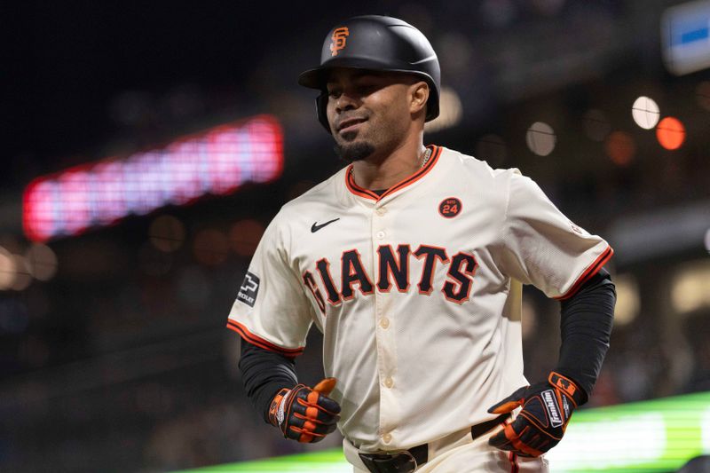 Sep 4, 2024; San Francisco, California, USA;  San Francisco Giants first base LaMonte Wade Jr. (31) smiles after hitting a two run home run during the seventh inning against the Arizona Diamondbacks at Oracle Park. Mandatory Credit: Stan Szeto-Imagn Images