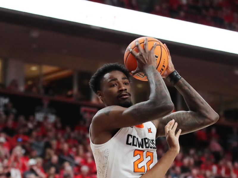 Mar 4, 2023; Lubbock, Texas, USA;  Oklahoma State Cowboys forward Kalib Boone (22) takes a rebound in front of Texas Tech Red Raiders guard Lamar Washington (1) in the first half at United Supermarkets Arena. Mandatory Credit: Michael C. Johnson-USA TODAY Sports