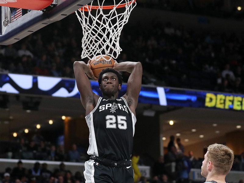 MEMPHIS, TENNESSEE - APRIL 09: Sidy Cissoko #25 of the San Antonio Spurs goes to the basket during the second half against the Memphis Grizzlies at FedExForum on April 09, 2024 in Memphis, Tennessee. NOTE TO USER: User expressly acknowledges and agrees that, by downloading and or using this photograph, User is consenting to the terms and conditions of the Getty Images License Agreement. (Photo by Justin Ford/Getty Images)