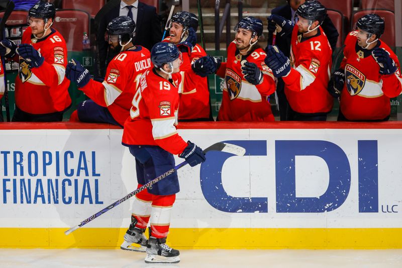 Apr 4, 2023; Sunrise, Florida, USA; Florida Panthers left wing Matthew Tkachuk (19) celebrates with teammates after scoring during the third period against the Buffalo Sabres at FLA Live Arena. Mandatory Credit: Sam Navarro-USA TODAY Sports