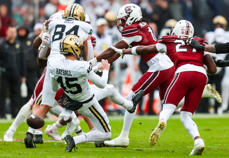 Nov 11, 2023; Columbia, South Carolina, USA; South Carolina Gamecocks defensive back Keenan Nelson Jr. (18) blocks a punt by Vanderbilt Commodores punter Matthew Hayball (45) in the second half at Williams-Brice Stadium. Nelson recovered the ball and returned it for a touchdown. Mandatory Credit: Jeff Blake-USA TODAY Sports