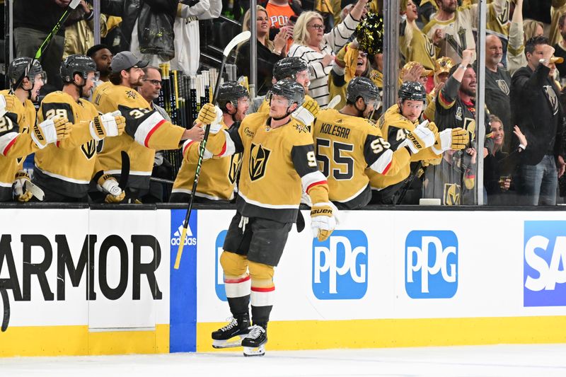 Apr 27, 2024; Las Vegas, Nevada, USA; Vegas Golden Knights center Jack Eichel (9) celebrates his second-period goal with teammates on the bench against the Dallas Stars in game three of the first round of the 2024 Stanley Cup Playoffs at T-Mobile Arena. Mandatory Credit: Candice Ward-USA TODAY Sports