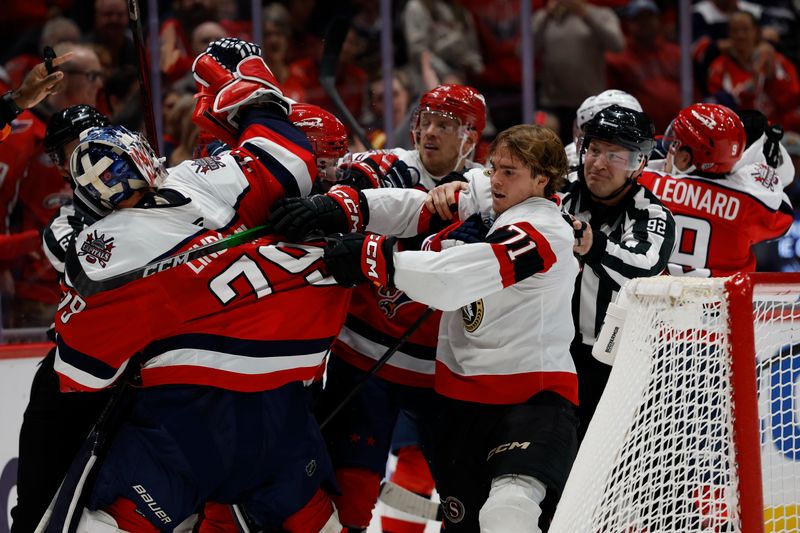 Oct 25, 2025; Washington, District of Columbia, USA; Washington Capitals goaltender Charlie Lindgren (79) gets involved in a scrum with Ottawa Senators center Ridly Greig (71) during the second period at Capital One Arena. Mandatory Credit: Geoff Burke-Imagn Images