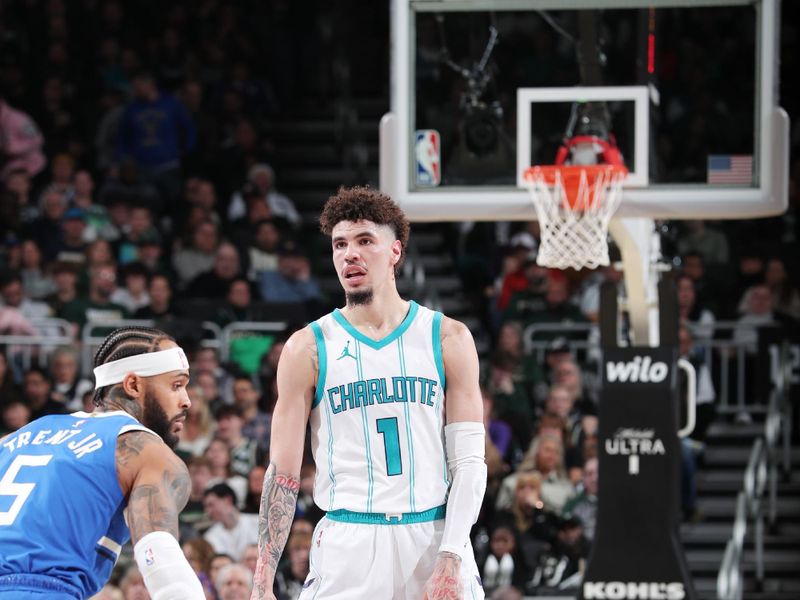 MILWAUKEE, WI - NOVEMBER 23: LaMelo Ball #1 of the Charlotte Hornets dribbles the ball during the game against the Milwaukee Bucks on November 23, 2024 at the Fiserv Forum Center in Milwaukee, Wisconsin. NOTE TO USER: User expressly acknowledges and agrees that, by downloading and or using this Photograph, user is consenting to the terms and conditions of the Getty Images License Agreement. Mandatory Copyright Notice: Copyright 2024 NBAE (Photo by Gary Dineen/NBAE via Getty Images).