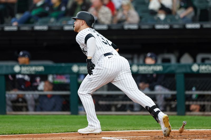 Sep 16, 2023; Chicago, Illinois, USA; Chicago White Sox right fielder Gavin Sheets (32) watches his three run home run against the Minnesota Twins during the first inning at Guaranteed Rate Field. Mandatory Credit: Kamil Krzaczynski-USA TODAY Sports