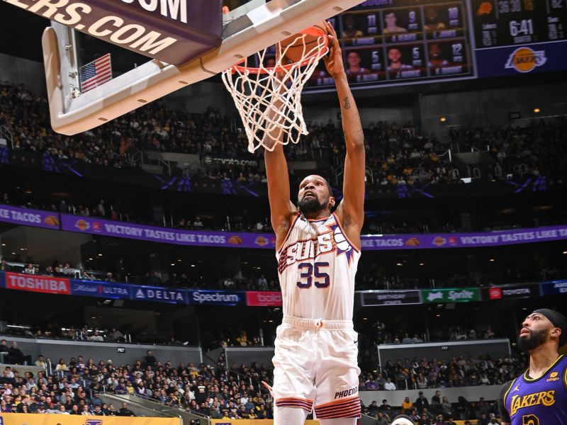 LOS ANGELES, CA - JANUARY 11: Kevin Durant #35 of the Phoenix Suns dunks the ball during the game against the Los Angeles Lakers on January 11, 2024 at Crypto.Com Arena in Los Angeles, California. NOTE TO USER: User expressly acknowledges and agrees that, by downloading and/or using this Photograph, user is consenting to the terms and conditions of the Getty Images License Agreement. Mandatory Copyright Notice: Copyright 2024 NBAE (Photo by Andrew D. Bernstein/NBAE via Getty Images)