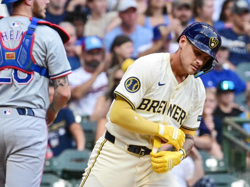 Jun 25, 2024; Milwaukee, Wisconsin, USA; Milwaukee Brewers third baseman Joey Ortiz (3) reacts after striking out in the second inning against the Texas Rangers at American Family Field. Mandatory Credit: Benny Sieu-USA TODAY Sports