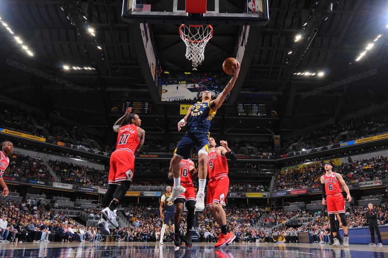 INDIANAPOLIS, IN - MARCH 13:  Andrew Nembhard #2 of the Indiana Pacers goes to the basket during the game on March 13, 2024 at Gainbridge Fieldhouse in Indianapolis, Indiana. NOTE TO USER: User expressly acknowledges and agrees that, by downloading and or using this Photograph, user is consenting to the terms and conditions of the Getty Images License Agreement. Mandatory Copyright Notice: Copyright 2024 NBAE (Photo by Ron Hoskins/NBAE via Getty Images)