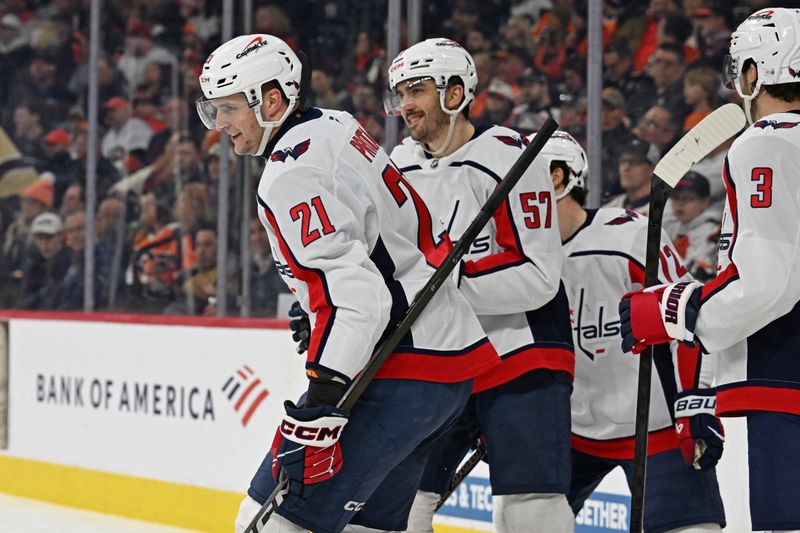 Feb 3, 2026; Philadelphia, Pennsylvania, USA; Washington Capitals center Aliaksei Protas (21) celebrates his goal with teammates against the Philadelphia Flyers during the second period at Xfinity Mobile Arena. Mandatory Credit: Eric Hartline-Imagn Images