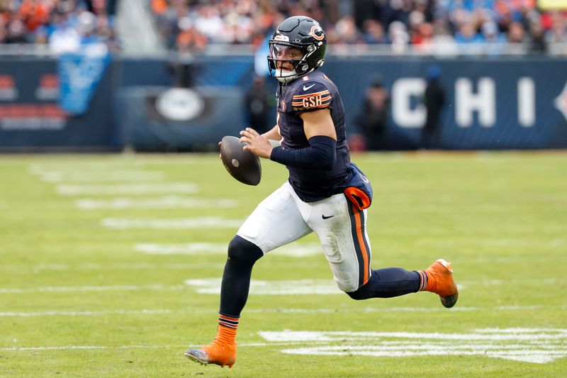 Chicago Bears quarterback Justin Fields (1) runs with the ball to score a touchdown against the Detroit Lions during the second half of an NFL football game, Sunday, Dec. 10, 2023, in Chicago. (AP Photo/Kamil Krzaczynski)