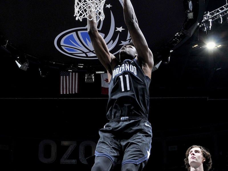 ORLANDO, FL - JANUARY 4: Mo Bamba #11 of the Orlando Magic dunks the ball against the Oklahoma City Thunder on January 4, 2023 at Amway Center in Orlando, Florida. NOTE TO USER: User expressly acknowledges and agrees that, by downloading and or using this photograph, User is consenting to the terms and conditions of the Getty Images License Agreement. Mandatory Copyright Notice: Copyright 2023 NBAE (Photo by Fernando Medina/NBAE via Getty Images)