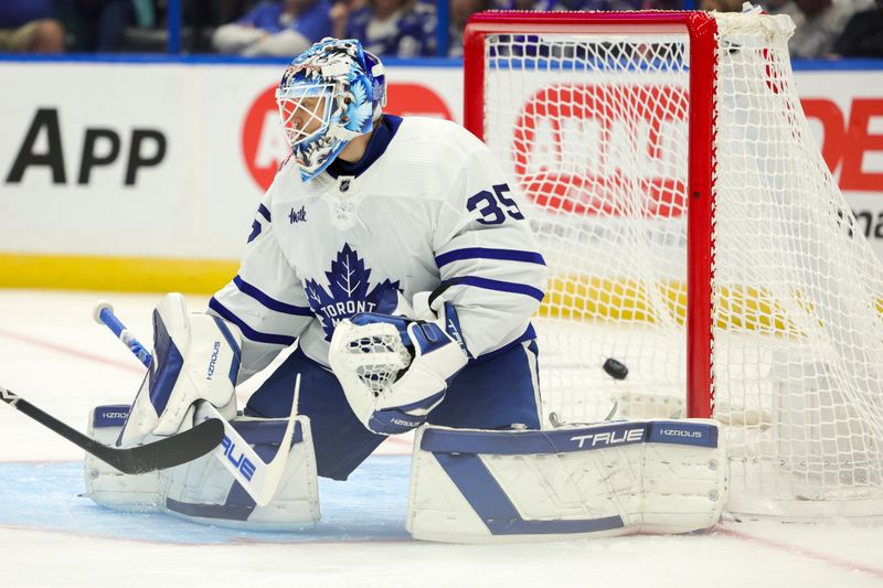 Oct 21, 2023; Tampa, Florida, USA;  a shot from Tampa Bay Lightning right wing Nikita Kucherov (86) (not pictured) goes past Toronto Maple Leafs goaltender Ilya Samsonov (35) for a goal in the first period at Amalie Arena. Mandatory Credit: Nathan Ray Seebeck-USA TODAY Sports