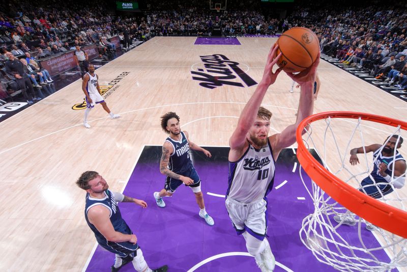 SACRAMENTO, CA - MARCH 29:  Domantas Sabonis #10 of the Sacramento Kings goes to the basket during the game on March 29, 2024 at Golden 1 Center in Sacramento, California. NOTE TO USER: User expressly acknowledges and agrees that, by downloading and or using this Photograph, user is consenting to the terms and conditions of the Getty Images License Agreement. Mandatory Copyright Notice: Copyright 2024 NBAE (Photo by Rocky Widner/NBAE via Getty Images)