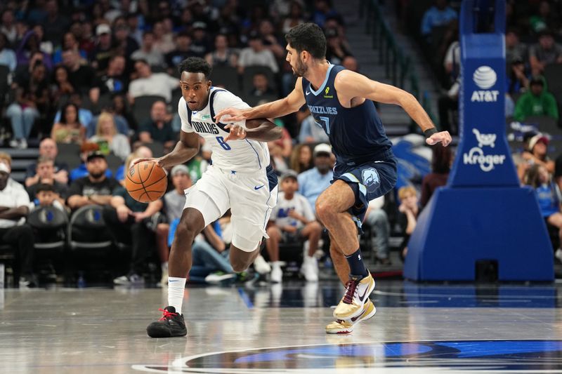 DALLAS, TX - OCTOBER 7: Olivier Maxence-Prosper #8 of the Dallas Mavericks dribbles the ball during the game against the Memphis Grizzlies during the 2024 NBA Preseason on October 7, 2024 at dalAmerican Airlines Center in Dallas, Texas. NOTE TO USER: User expressly acknowledges and agrees that, by downloading and or using this photograph, User is consenting to the terms and conditions of the Getty Images License Agreement. Mandatory Copyright Notice: Copyright 2024 NBAE (Photo by Glenn James/NBAE via Getty Images)