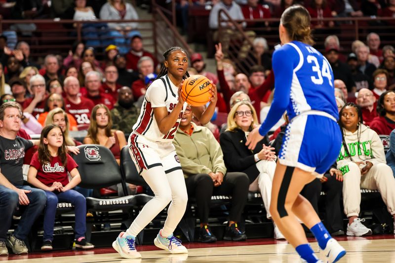 Jan 15, 2024; Columbia, South Carolina, USA; South Carolina Gamecocks guard MiLaysia Fulwiley (12) attempts a three point basket against the Kentucky Wildcats in the first half at Colonial Life Arena. Mandatory Credit: Jeff Blake-USA TODAY Sports