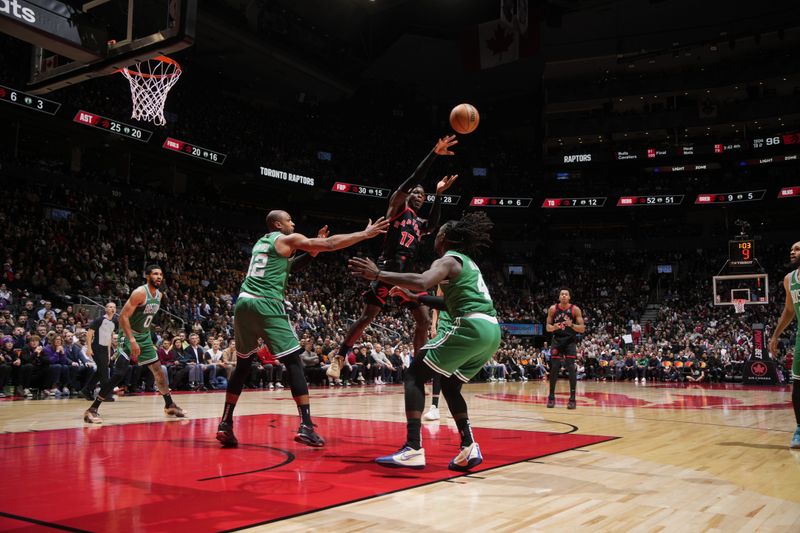 TORONTO, CANADA - JANUARY 15:  Dennis Schroder #17 of the Toronto Raptors passes the ball during the game against the Boston Celtics on January 15, 2024 at the Scotiabank Arena in Toronto, Ontario, Canada.  NOTE TO USER: User expressly acknowledges and agrees that, by downloading and or using this Photograph, user is consenting to the terms and conditions of the Getty Images License Agreement.  Mandatory Copyright Notice: Copyright 2024 NBAE (Photo by Mark Blinch/NBAE via Getty Images)