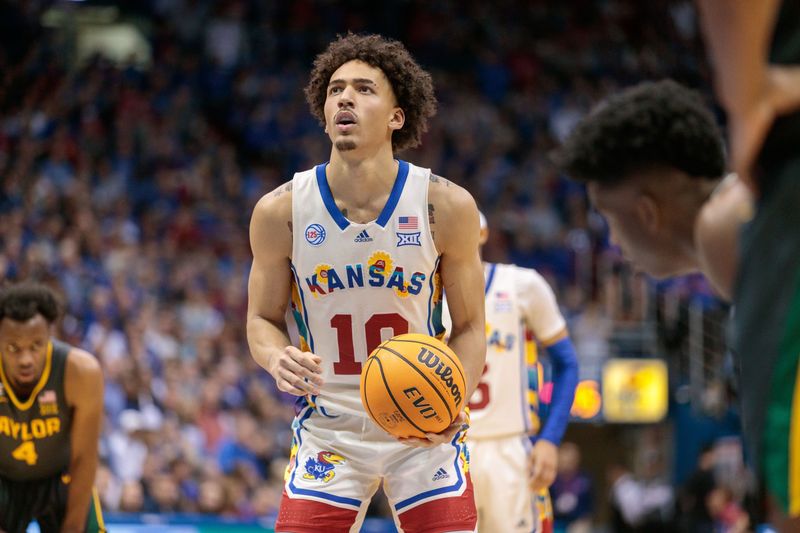 Feb 18, 2023; Lawrence, Kansas, USA; Kansas Jayhawks forward Jalen Wilson (10) shoots a free throw against the Baylor Bears during the second half at Allen Fieldhouse. Mandatory Credit: William Purnell-USA TODAY Sports