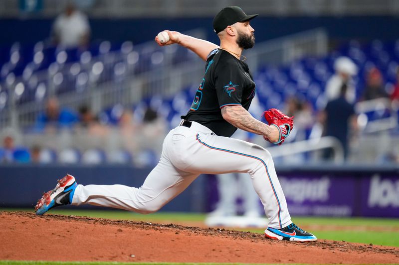 Jun 7, 2023; Miami, Florida, USA; Miami Marlins relief pitcher Tanner Scott (66) throws a pitch against the Kansas City Royals during the sixth inning at loanDepot Park. Mandatory Credit: Rich Storry-USA TODAY Sports